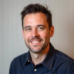 Professional headshot of Ben Carter, Creative Director